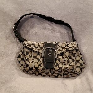 Black and gray coach purse